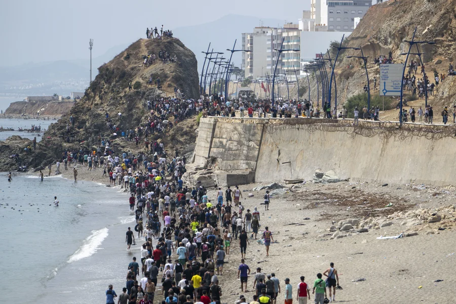 migrants-storm-ceuta-border.webp