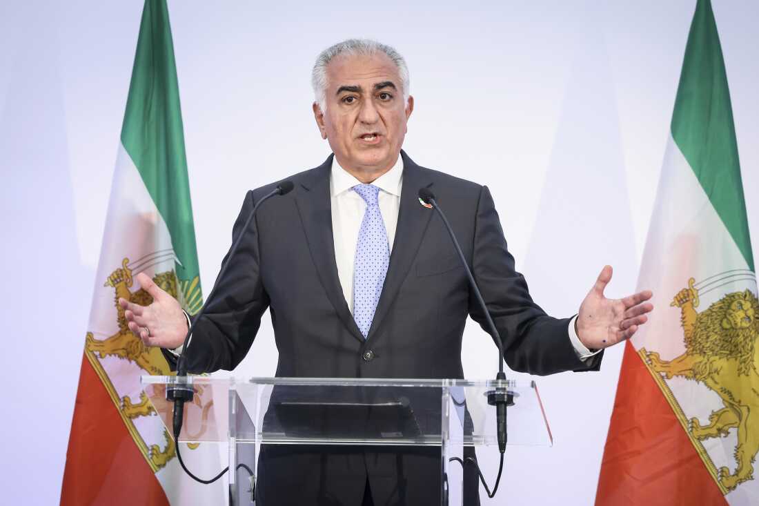 Reza Pahlavi, the son of Iran's toppled Shah Mohammad Reza Pahlavi, speaks during a press conference, Monday, June 23, 2025 in Paris. (AP Photo/Thomas Padilla)