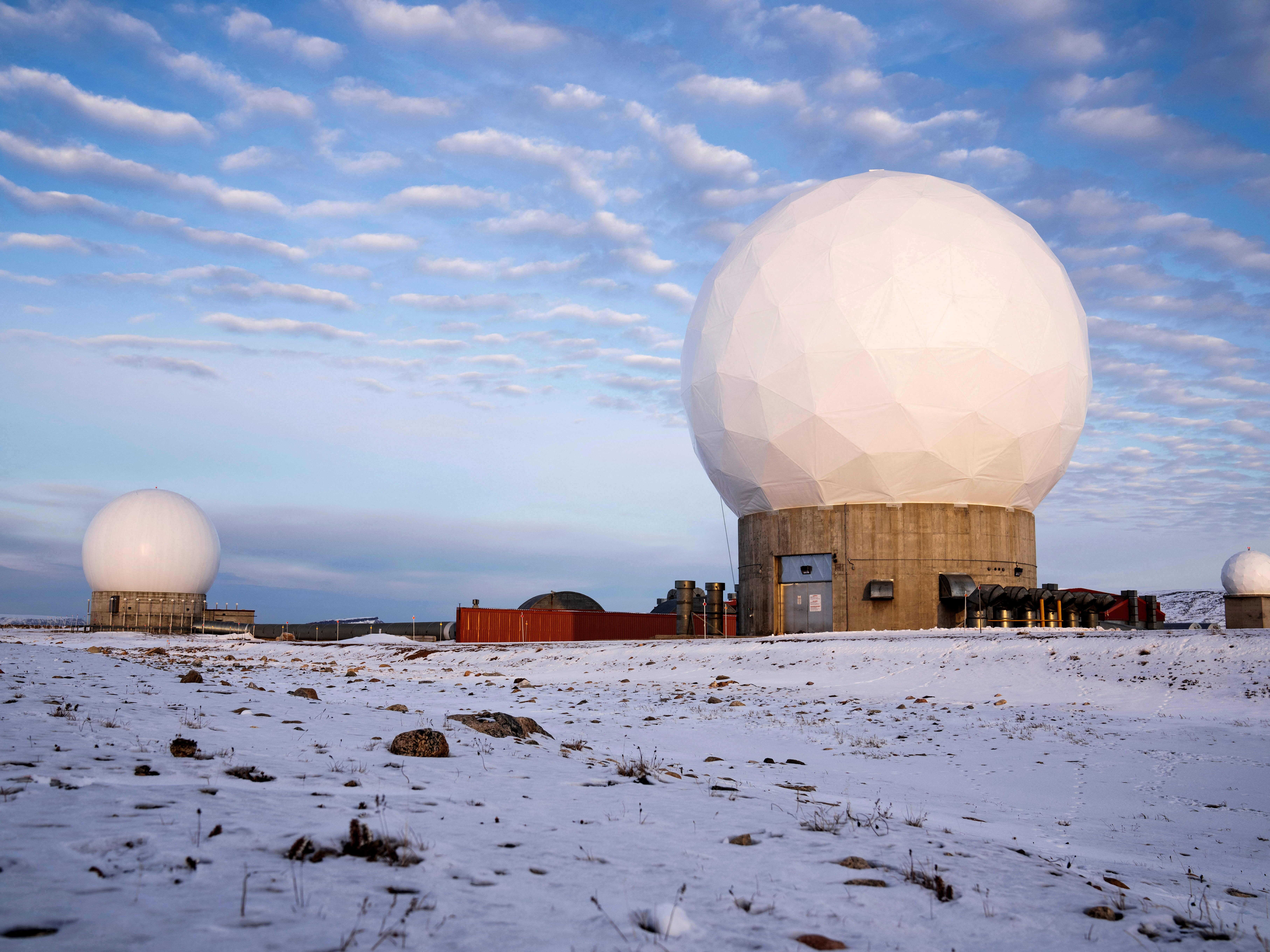 Pituffik Space Base, formerly Thule Air Base, with the domes of the Thule Tracking Station, is pictured in northern Greenland on October 4, 2023. The base changed its name in early 2023. The reason for the new name is, among other things, that the base is no longer staffed by people from the US Air Force, but instead from the US Space Force, which was established in December 2019. (Photo by Thomas Traasdahl / Ritzau Scanpix / AFP) / Denmark OUT