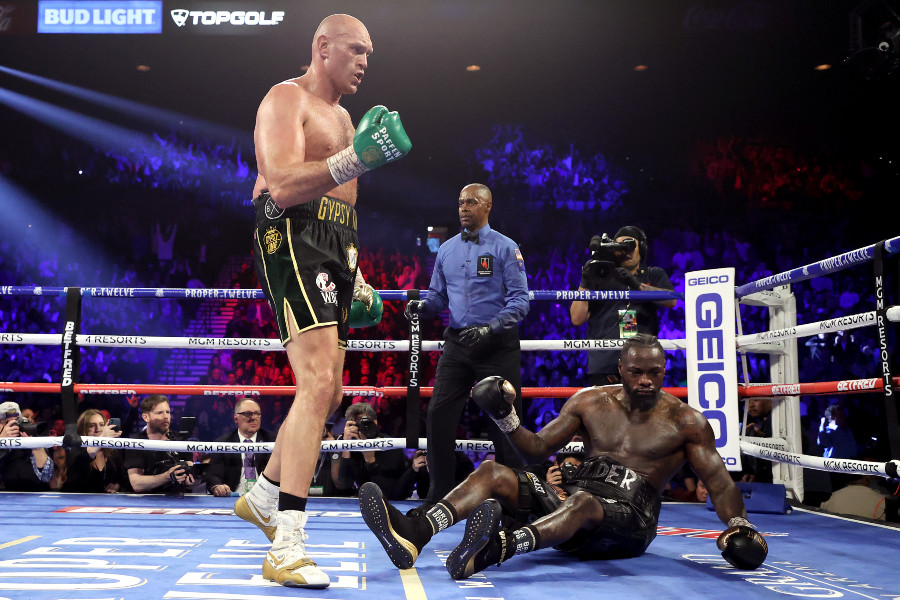 LAS VEGAS, NEVADA - FEBRUARY 22: Tyson Fury knocks down Deontay Wilder in the fifth during their Heavyweight bout for Wilder's WBC and Fury's lineal heavyweight title on February 22, 2020 at MGM Grand Garden Arena in Las Vegas, Nevada. (Photo by Al Bello/Getty Images)