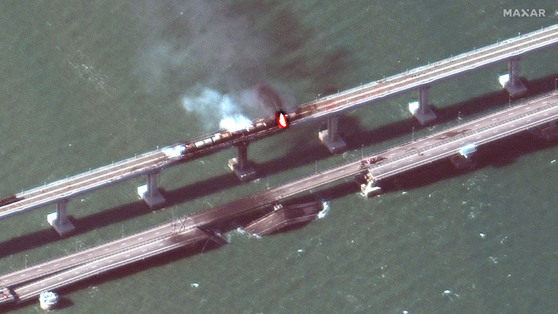 KERCH BRIDGE, CRIMEA -- OCTOBER 8, 2022: 03 Maxar closeup satellite imagery of burning rail cars and the damage to the Kerch Bridge in Crimea. Please use: Satellite image (c) 2022 Maxar Technologies.
